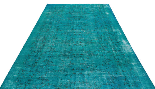 Load image 1 in gallery view. Teal distressed vintage-style rug with a faded black traditional pattern on a white background.