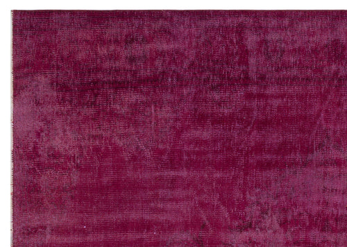 Load image 1 in gallery view. Deep magenta rug with a distressed, overdyed texture and subtle tonal variations.