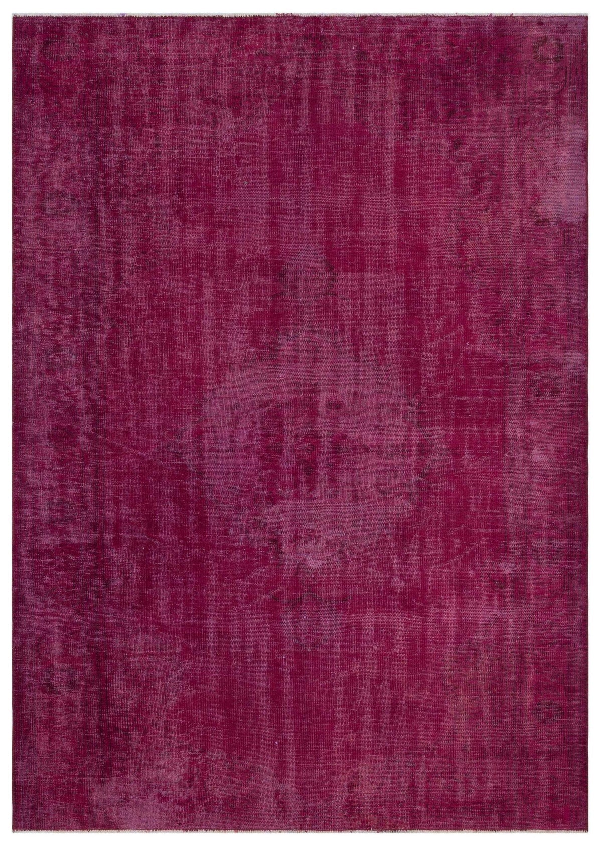 Magenta overdyed vintage rug with a distressed, faded texture and subtle tonal variations.