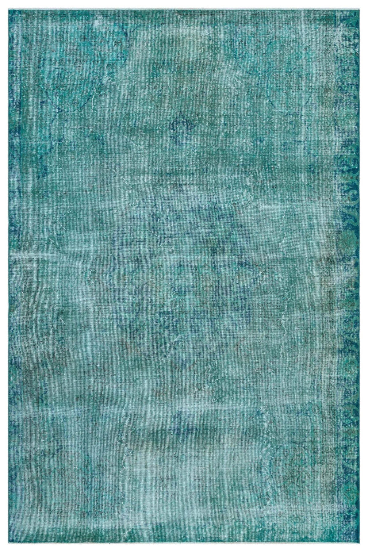 Teal and blue distressed area rug with a faded traditional medallion pattern on a white background.