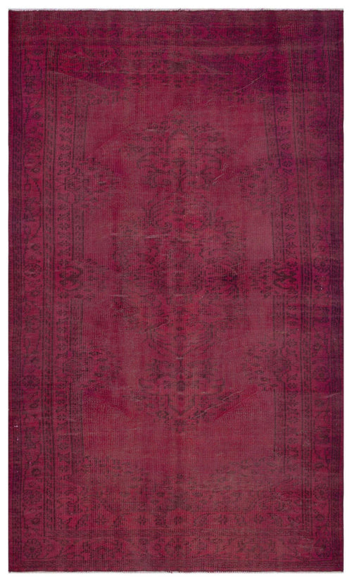 Load image 1 in gallery view. Deep magenta distressed rug with a traditional central medallion and ornate border pattern.
