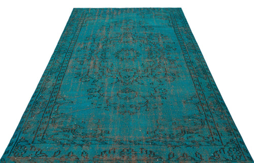Load image 1 in gallery view. Teal and charcoal distressed rug with a traditional central medallion and ornate border pattern on a white background.
