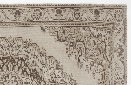 Load image 1 in gallery view. Beige and brown traditional rug with a distressed floral medallion pattern and a detailed geometric border.