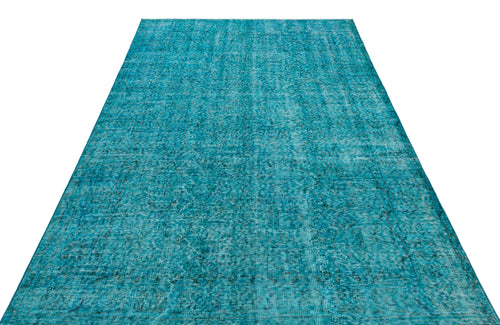 Load image 1 in gallery view. Teal rectangular rug with a distressed, faded traditional medallion pattern on a white background.