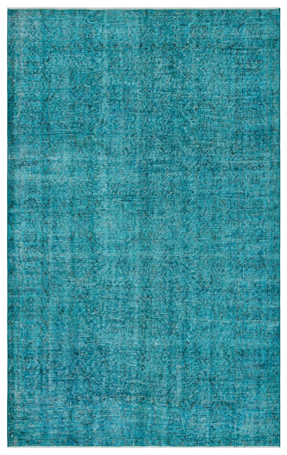 Teal distressed area rug with a faded, traditional overdyed pattern.