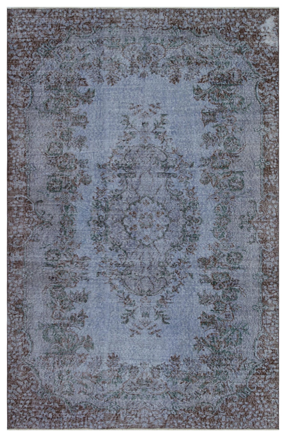 Distressed blue and brown traditional rug with a central floral medallion and ornate border.