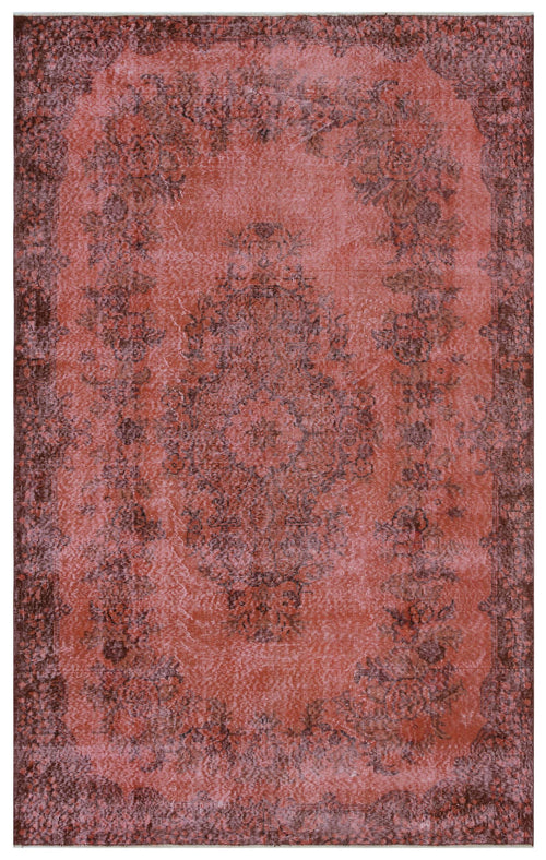 Load image 1 in gallery view. Distressed terracotta and dark brown rug with a traditional floral medallion and border pattern.