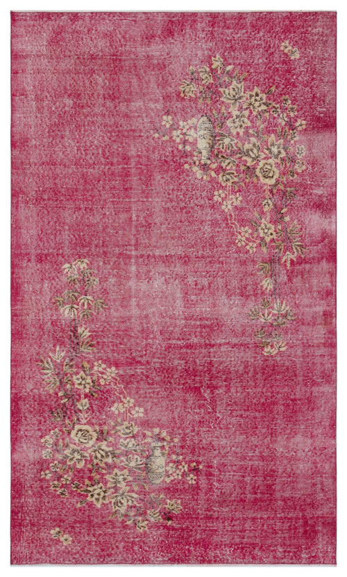 Load image 1 in gallery view. Fuchsia distressed rug with cream and olive floral branch motifs in opposite corners.