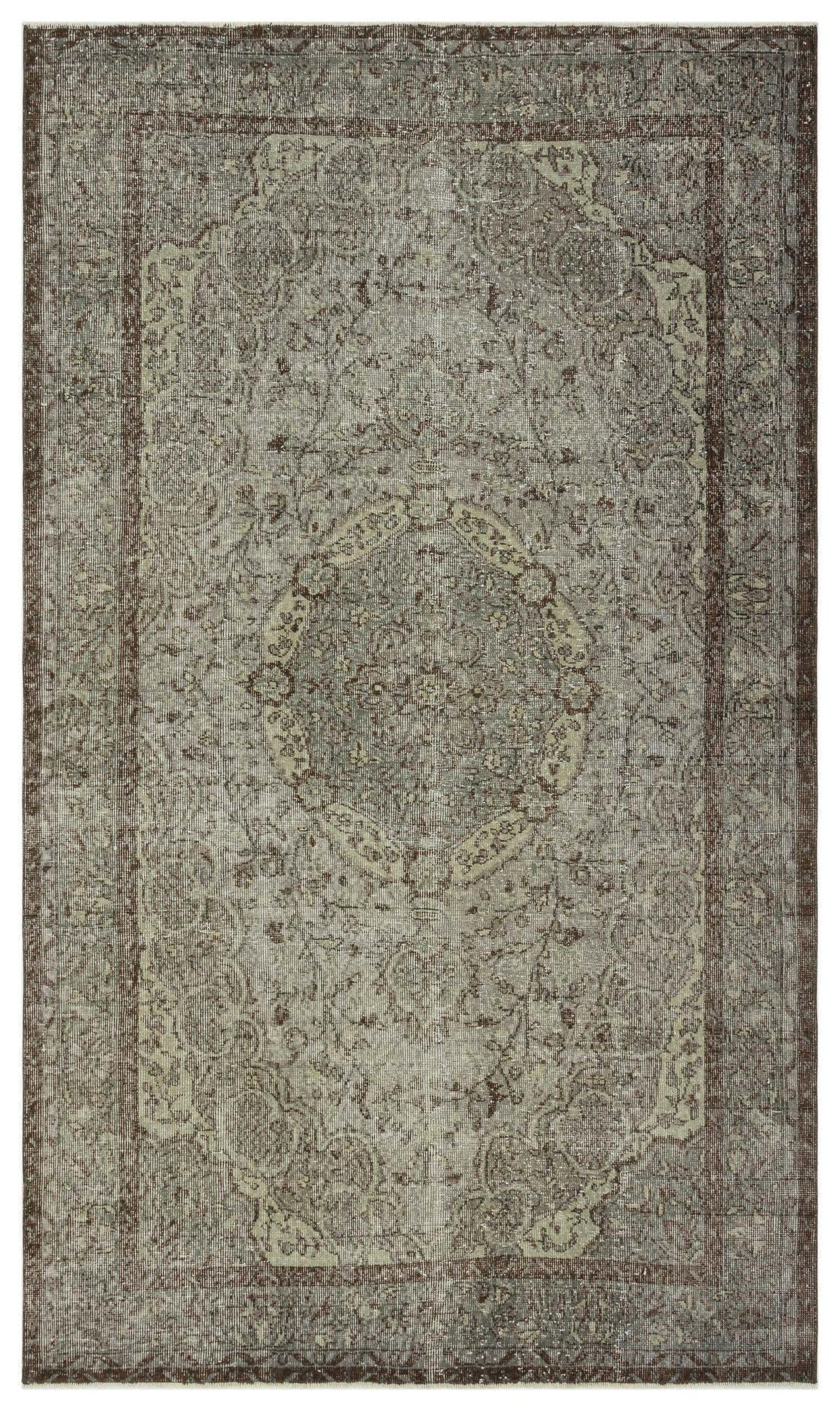 Distressed taupe and brown traditional rug with a central medallion and ornate floral border.