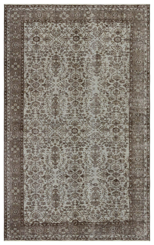 Load image 1 in gallery view. Brown and grey vintage-style rug with a distressed floral medallion pattern and a wide decorative border.