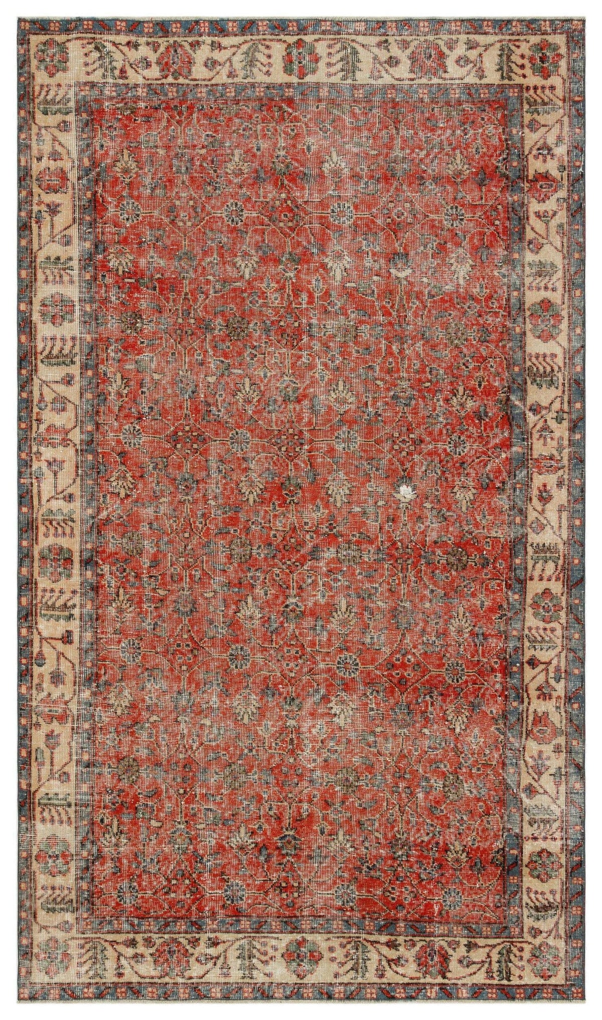 Red and beige traditional rug with a distressed floral lattice pattern and a decorative multi-layered border.