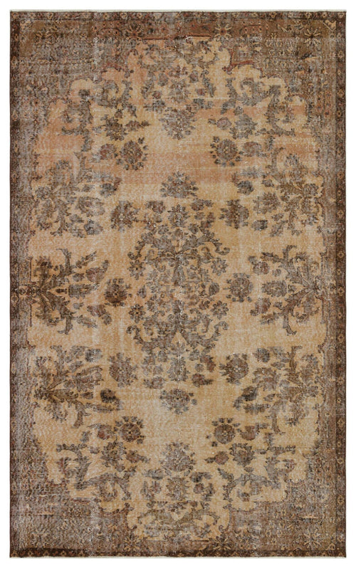 Load image 1 in gallery view. Distressed tan and brown vintage-style rug with a central floral medallion and ornate border.