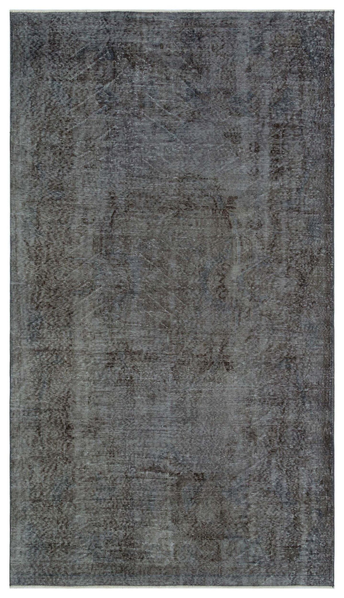 Charcoal and slate grey distressed rug with a faded traditional medallion pattern on a white background.