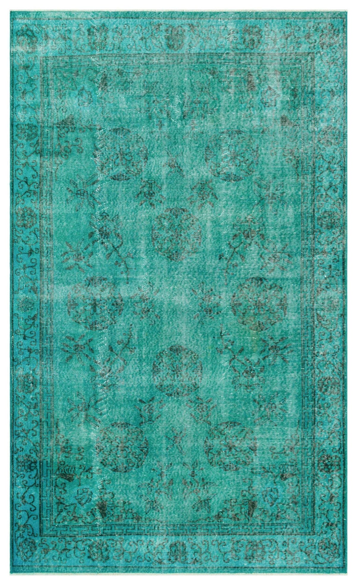 Teal distressed rug with a faded black traditional medallion and floral pattern and a geometric border.