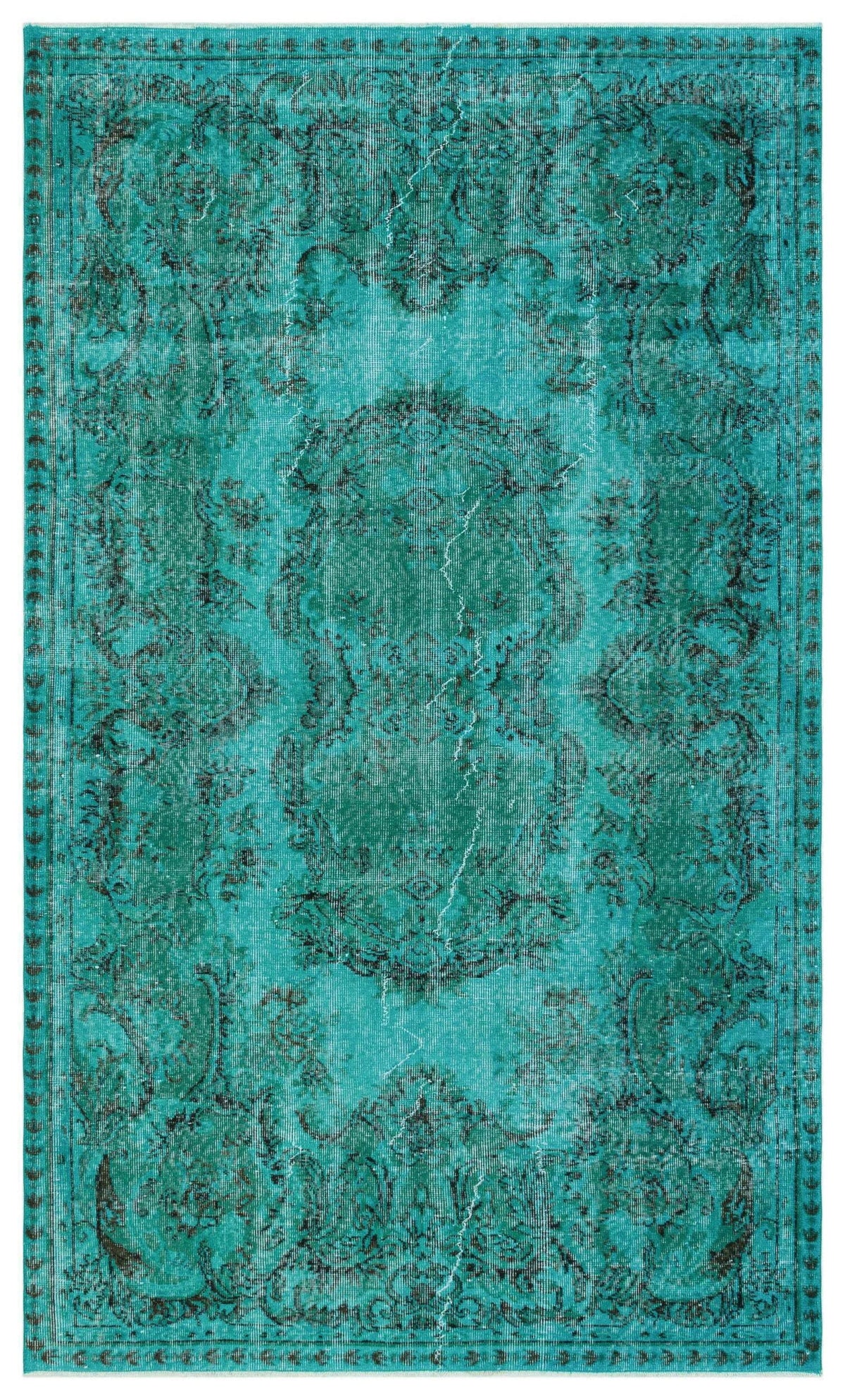 Teal and dark green distressed rug with a traditional central medallion and ornate floral border.