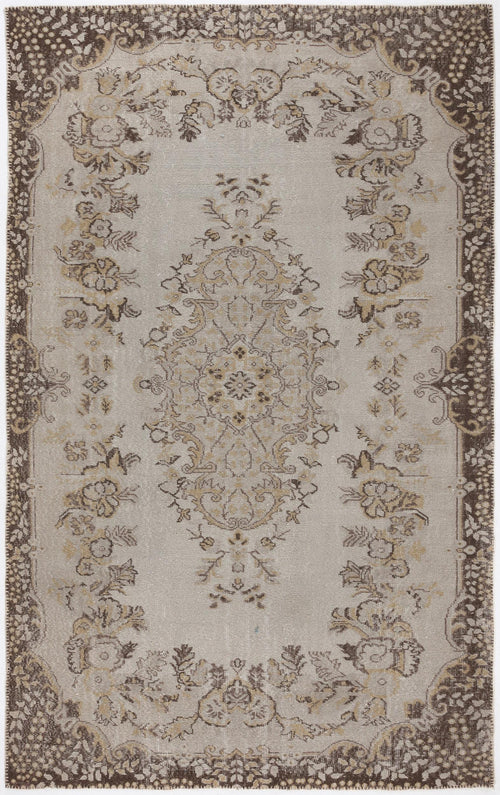 Load image 1 in gallery view. Beige and brown traditional rug with a central floral medallion and a decorative border.
