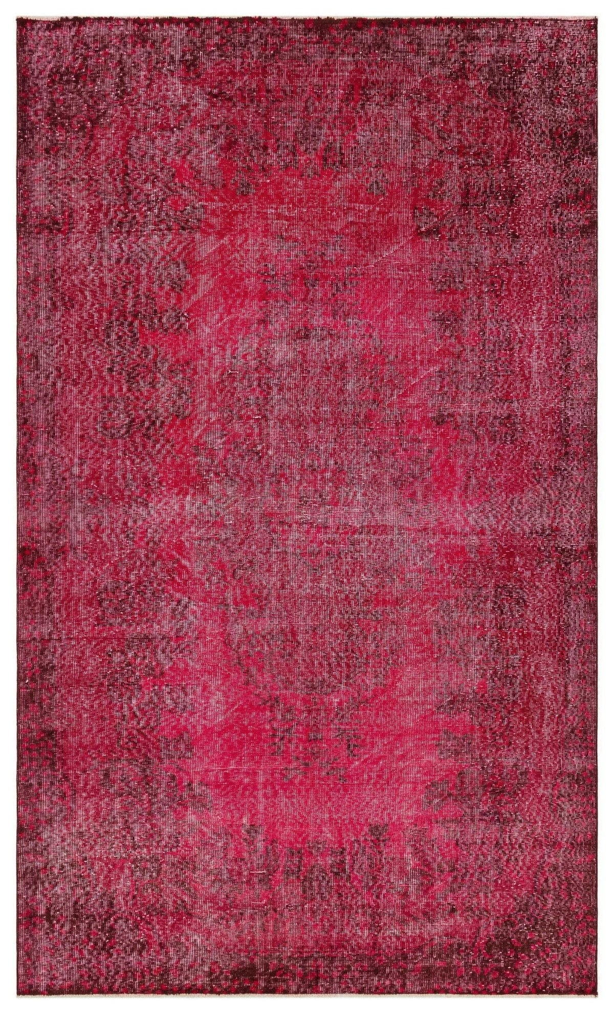 Magenta and dark red distressed overdyed rug with a faint traditional medallion pattern.