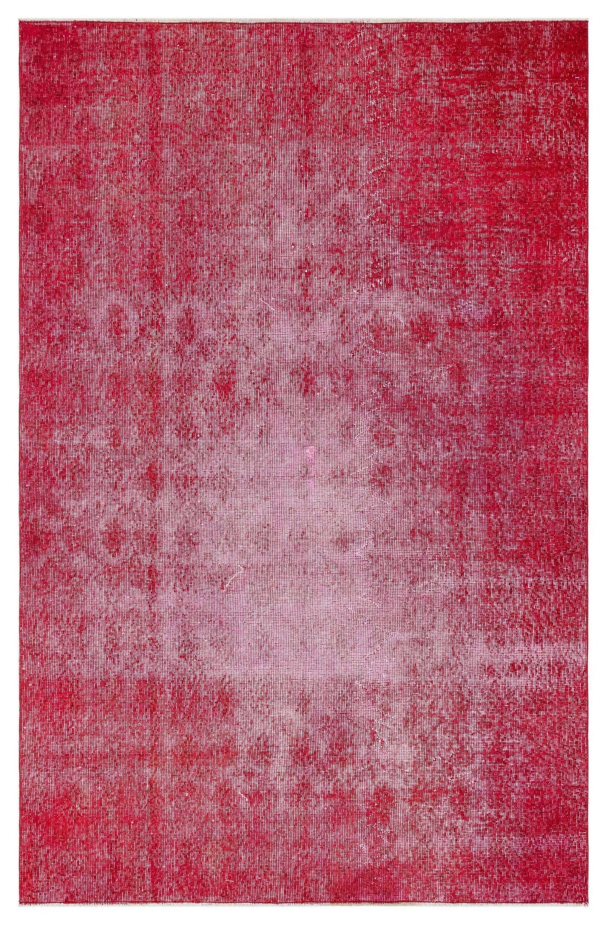 Solid crimson red rug with a distressed, faded texture and a lighter central area.