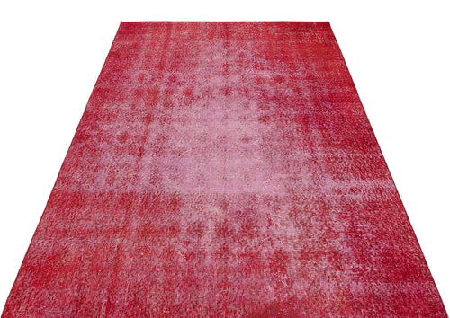 Load image 1 in gallery view. Red distressed vintage-style rug with a faded, textured finish on a white background.