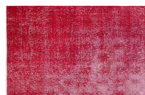 Load image 1 in gallery view. Deep red vintage-style rug with a distressed, faded texture and white fringe edge.