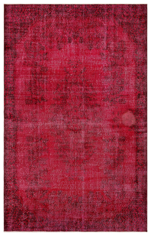 Load image 1 in gallery view. Deep magenta distressed rug with a faded traditional floral medallion pattern on a white background.