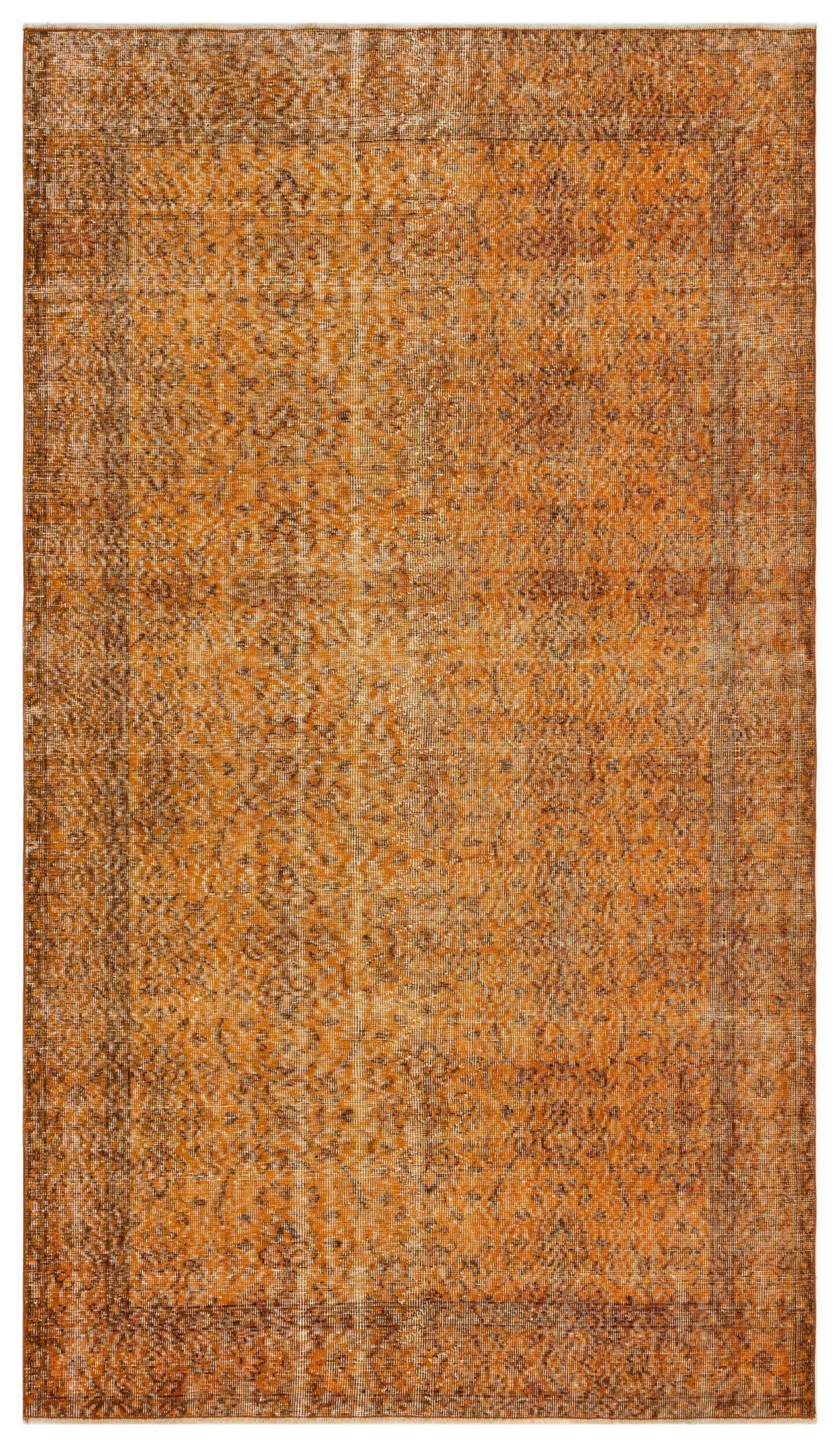 Burnt orange vintage-style rug with a distressed floral medallion pattern and a dark border.