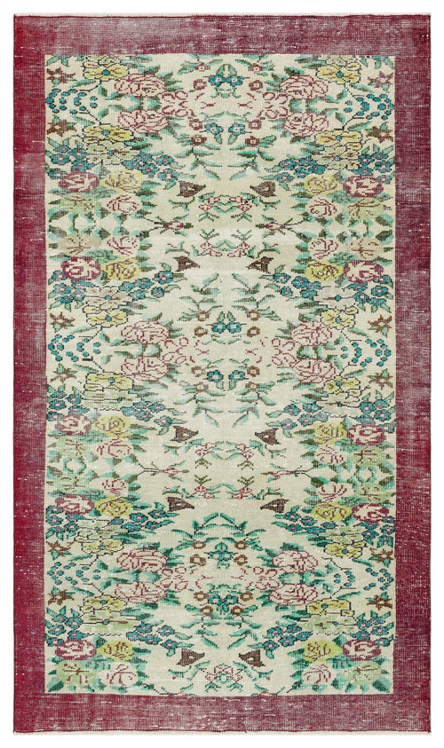 Load image 1 in gallery view. Cream rug with a distressed floral pattern in red, yellow, and teal, featuring a wide, solid red border.