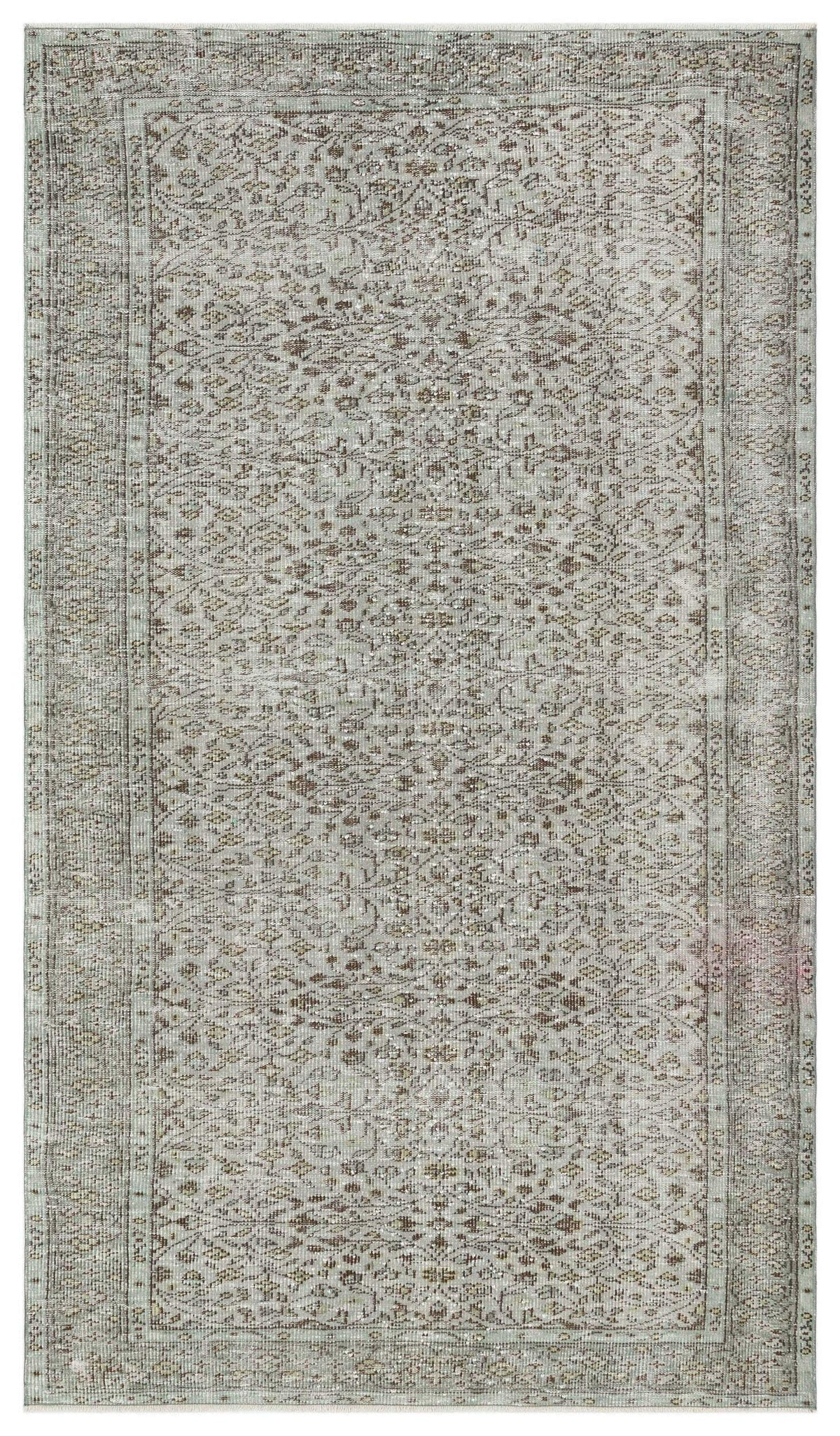 Sage green and brown distressed rug with an intricate traditional floral medallion pattern and a bordered edge.