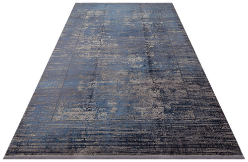 Load image 1 in gallery view. Blue and grey rectangular rug with a distressed, abstract textured pattern and a bordered design.
