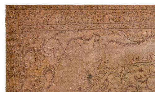 Load image 1 in gallery view. Distressed terracotta rug with a faded traditional floral border and central medallion pattern.
