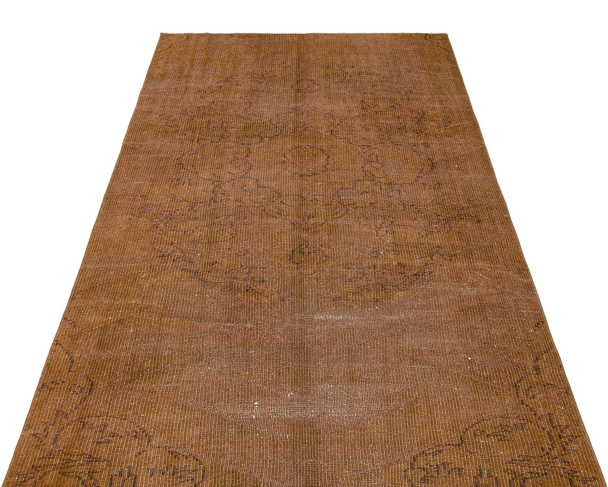 Solid brown vintage-style runner with a faint, distressed central medallion pattern.