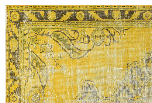 Load image 1 in gallery view. Mustard yellow and charcoal distressed rug with a traditional floral border and ornate medallion pattern.