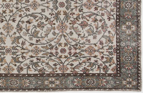 Load image 1 in gallery view. Cream, sage green, and dusty rose traditional rug with a floral vine pattern and a dark brown border.