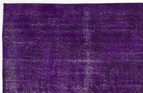 Load image 1 in gallery view. Deep purple vintage-style rug with a distressed, faded texture and subtle dark ornamental patterns.