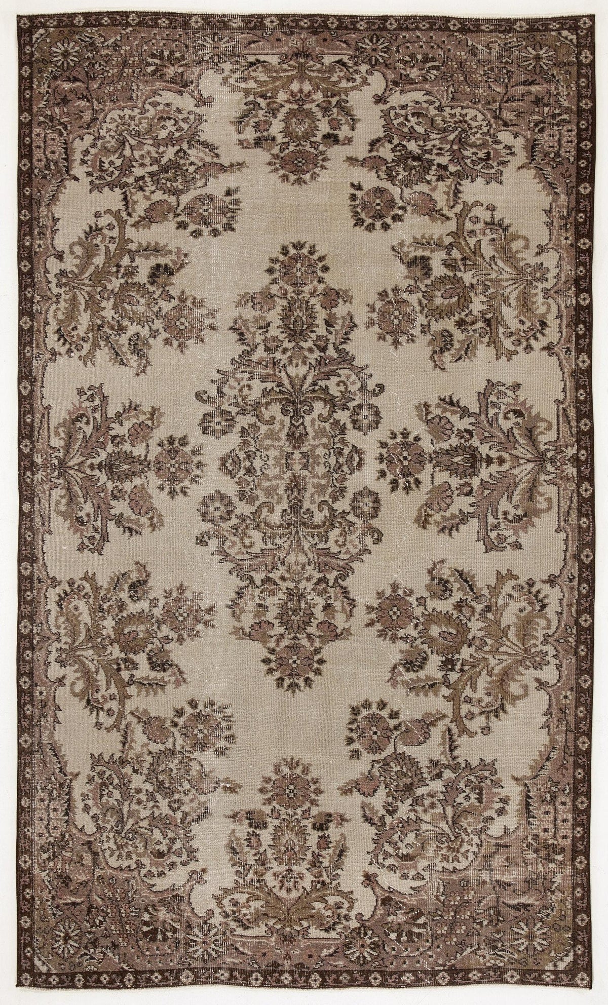 Beige and brown vintage-style rug with a central floral medallion and ornate botanical border.