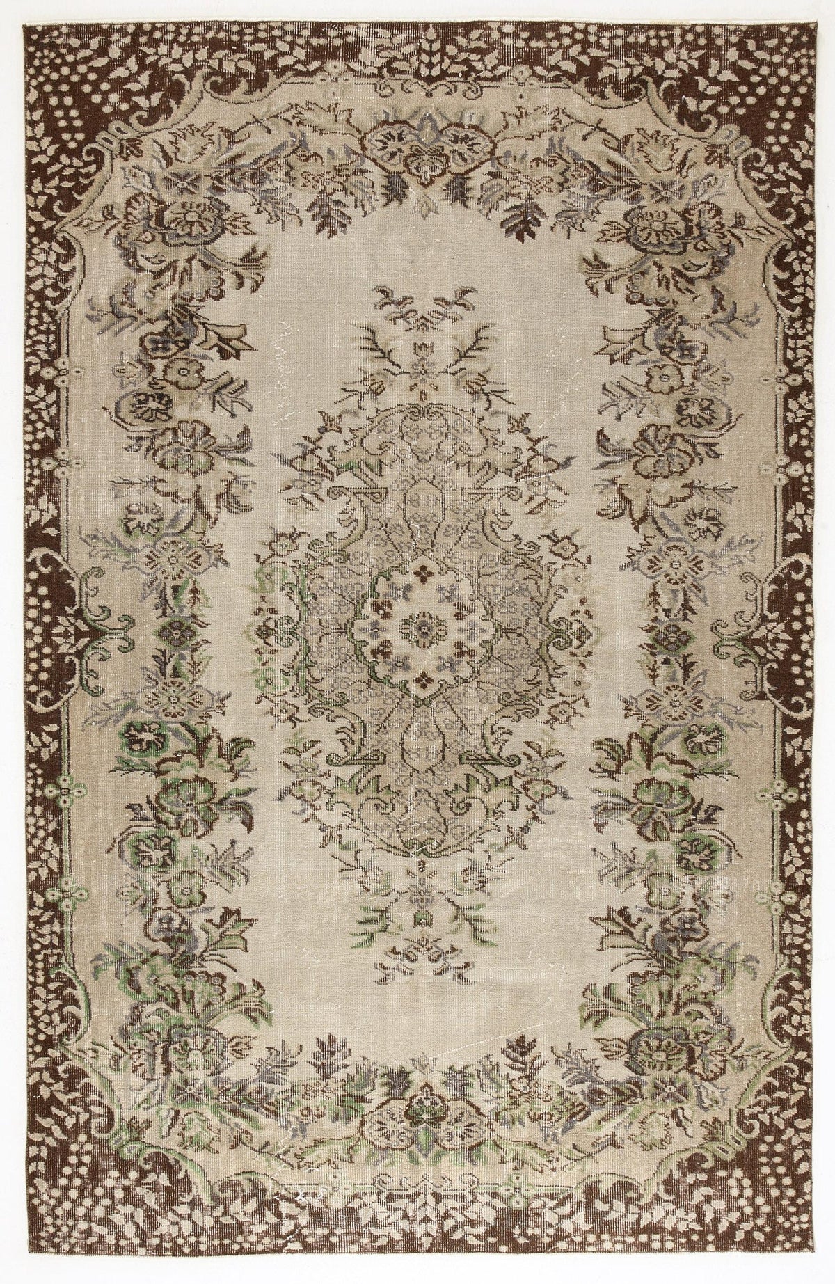 Beige and brown traditional rug with a central floral medallion and ornate botanical border.