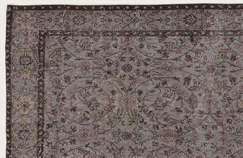 Load image 1 in gallery view. Grey and brown traditional rug with a distressed floral medallion pattern and a dark border.