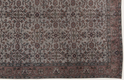 Load image 1 in gallery view. Grey and muted red traditional rug with a distressed floral vine pattern and a detailed border.