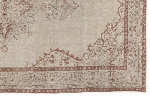 Load image 1 in gallery view. Beige and terracotta distressed rug with a traditional floral medallion pattern and a decorative border.