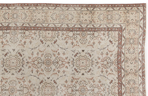 Load image 1 in gallery view. Beige and terracotta traditional rug with a distressed floral medallion pattern and geometric border.