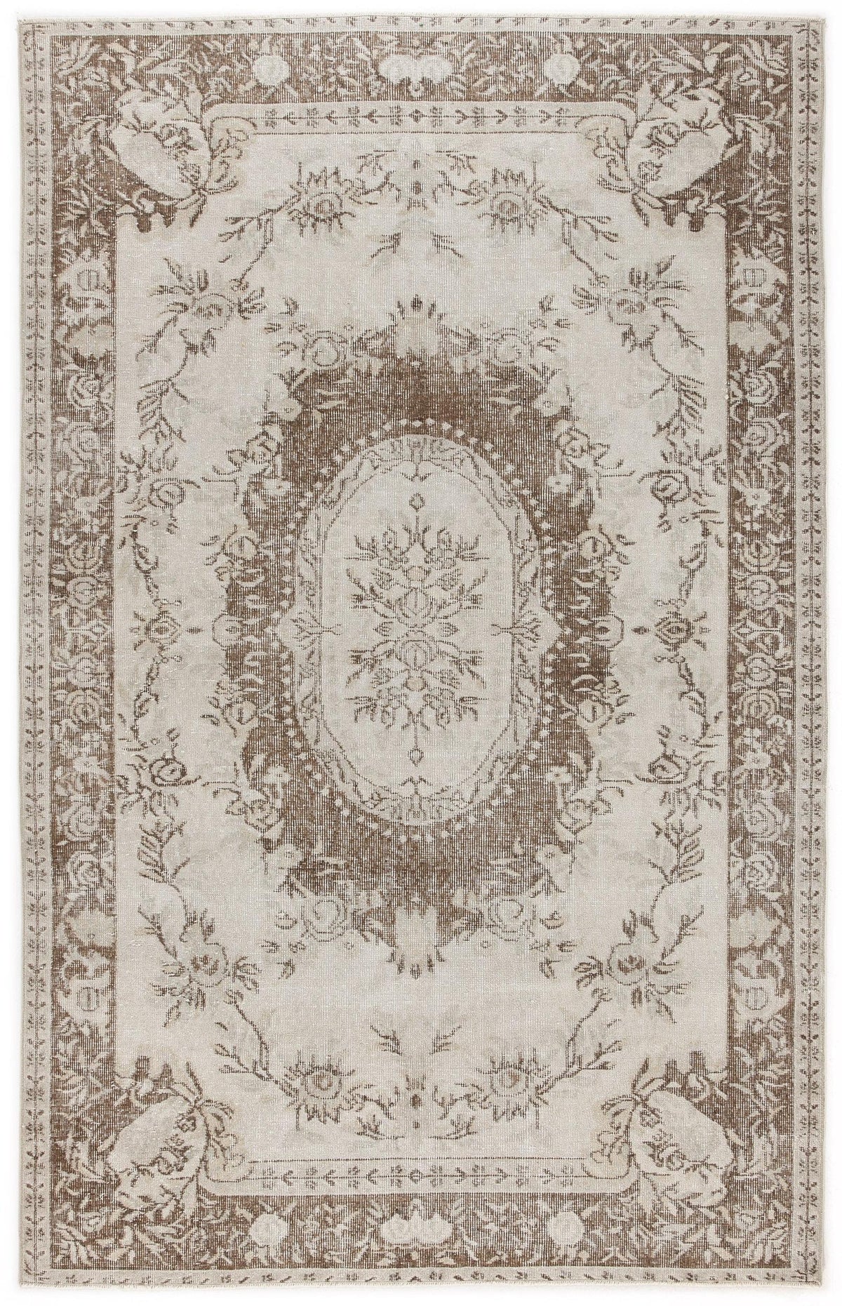 Beige and brown traditional rug with a central floral medallion and ornate botanical border.