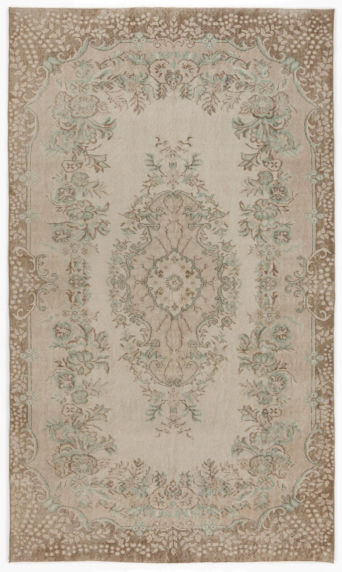 Beige and taupe traditional rug with a central floral medallion and intricate botanical border in soft sage green.