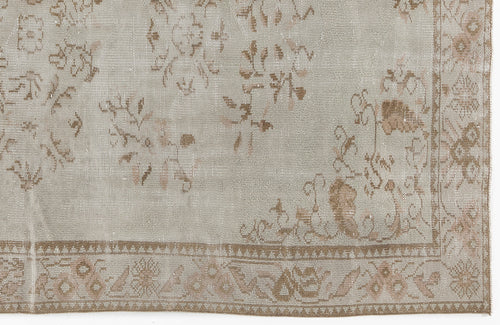 Load image 1 in gallery view. Light gray and beige distressed rug with a faded floral pattern and a detailed geometric border.