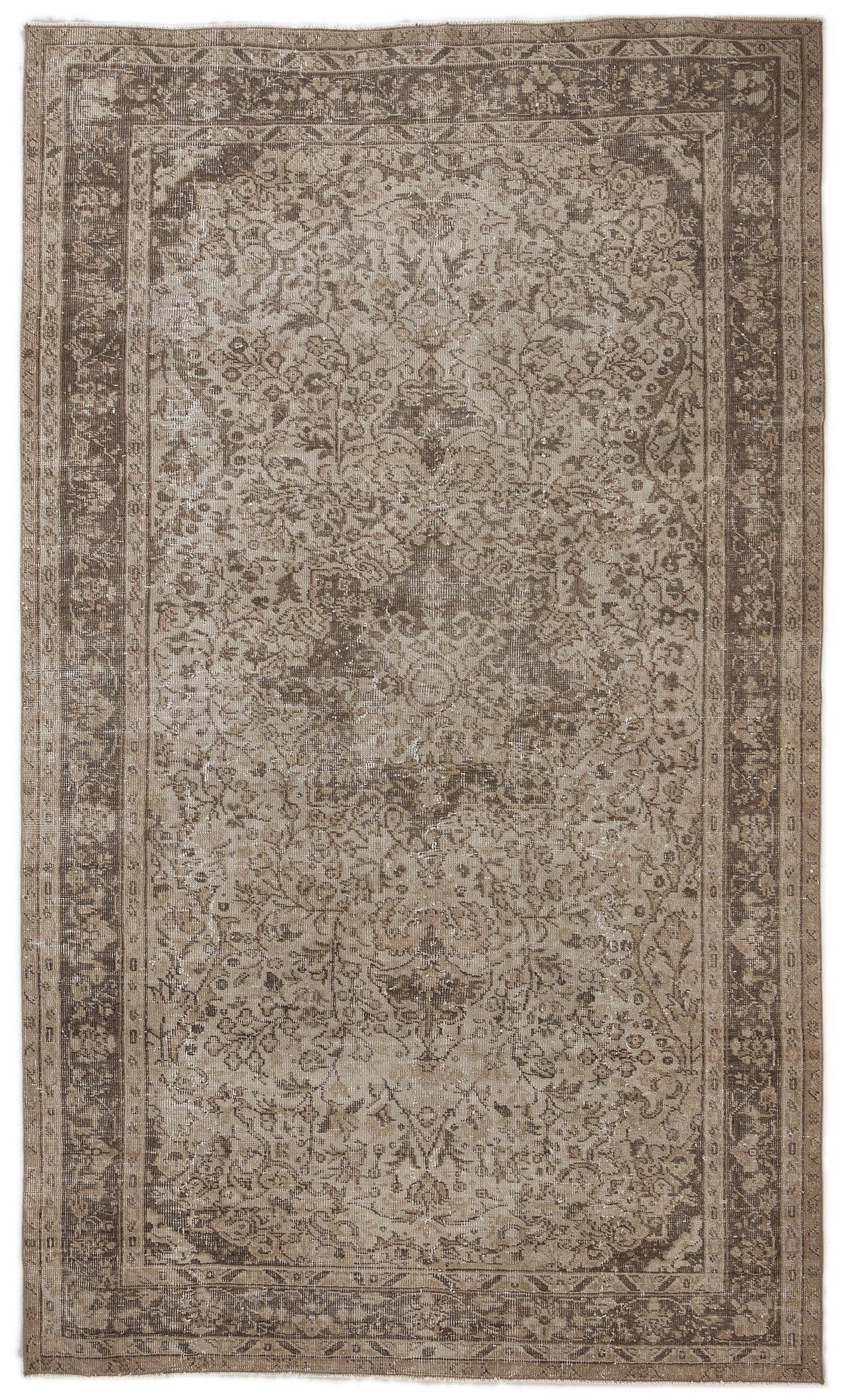 Taupe and brown vintage-style rug with a distressed floral medallion pattern and a wide decorative border.