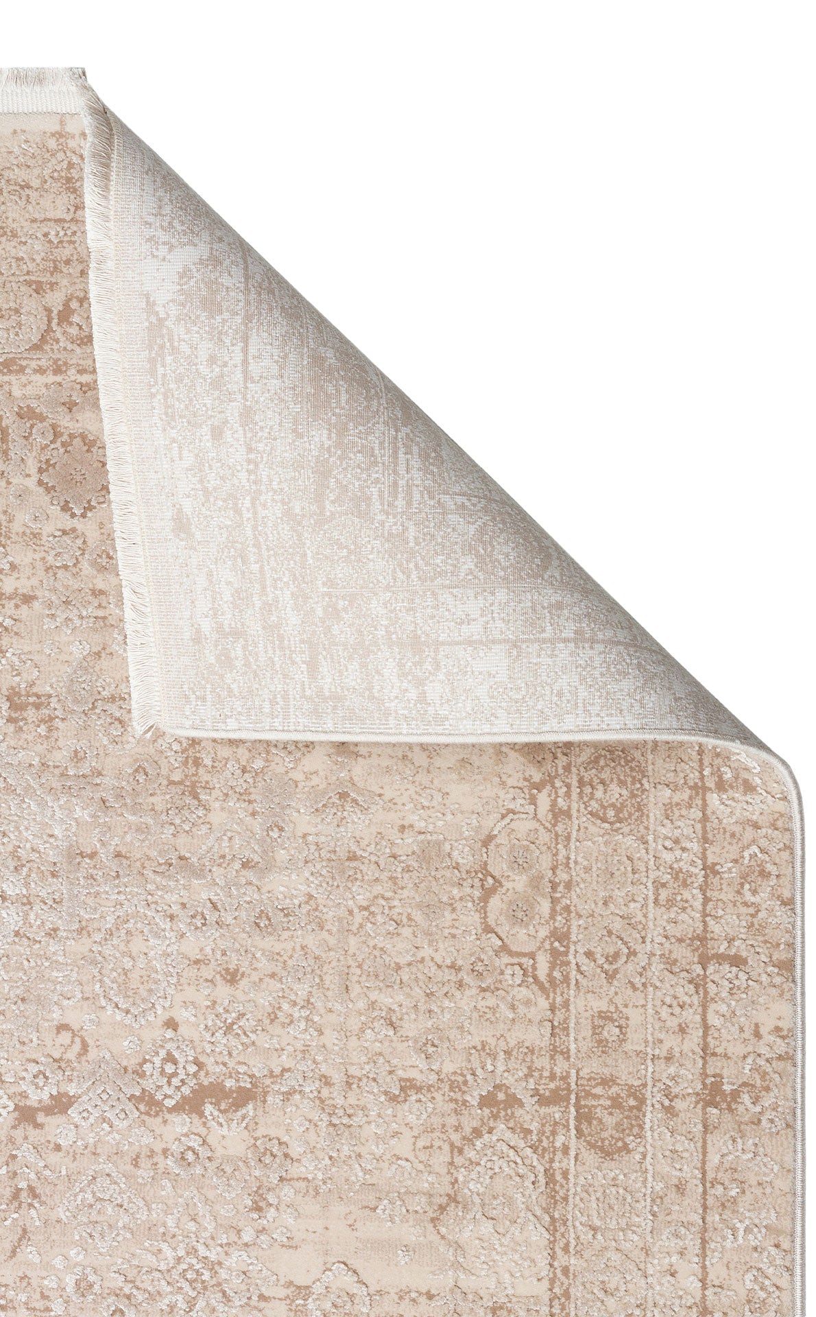 Beige and cream traditional medallion rug with a distressed finish, shown with a corner folded over on a white background.