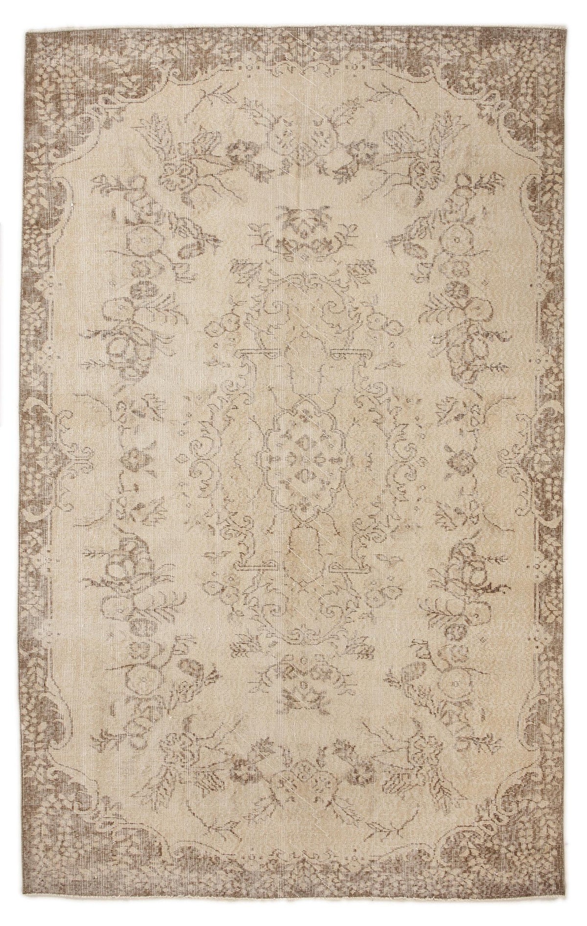Beige and brown vintage-style rug with a central floral medallion and ornate border on a white background.