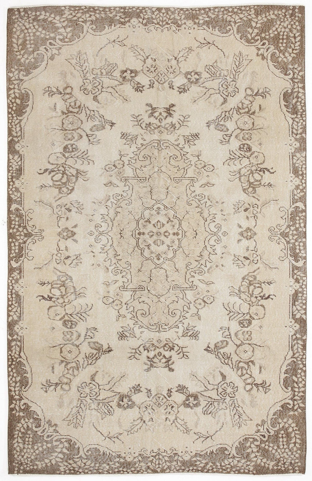 Beige and brown vintage-style rug with a central floral medallion and ornate border pattern on a white background.