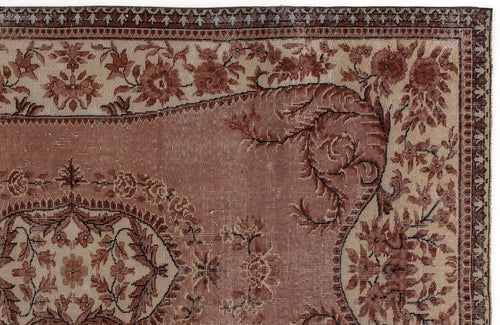 Load image 1 in gallery view. Terracotta and beige traditional rug with a floral medallion pattern and intricate border.