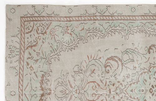 Load image 1 in gallery view. Beige, sage green, and terracotta rug with a distressed traditional floral border and medallion pattern.