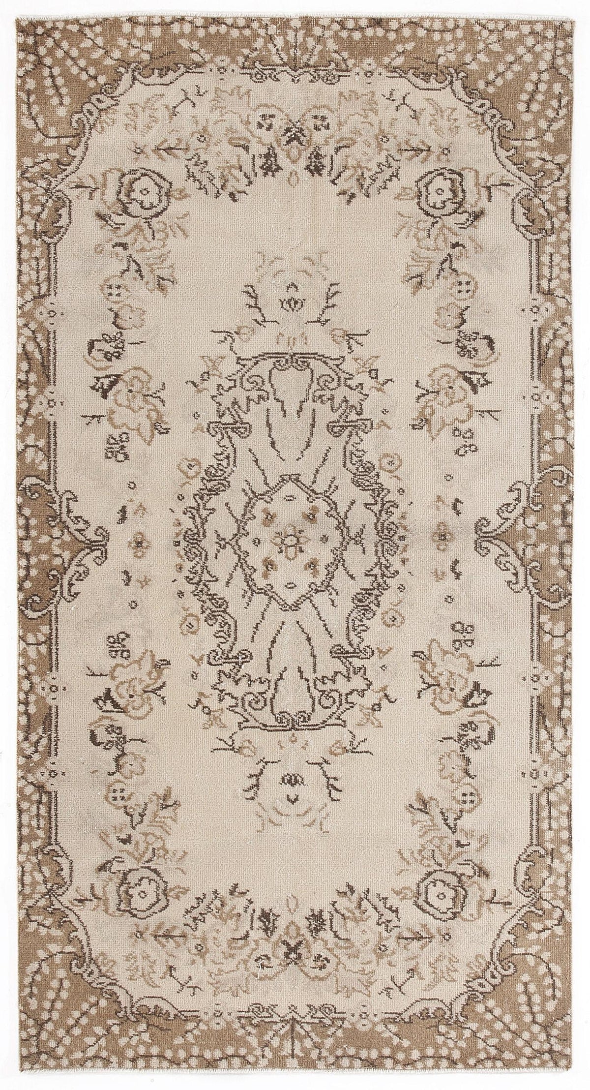 Beige and brown vintage-style rug with a central floral medallion and ornate border on a white background.